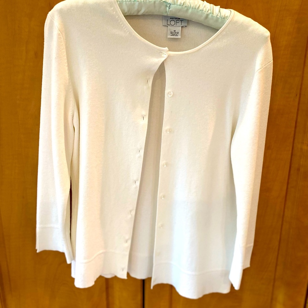 Loft cardigan . Off white size small . Slit in sleeve hem .pearly buttons .